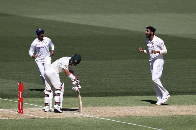 Jasprit Bumrah celebrates on trapping Matthew Wade in front of the wickets and dismissing him on Day 2 of the first Test