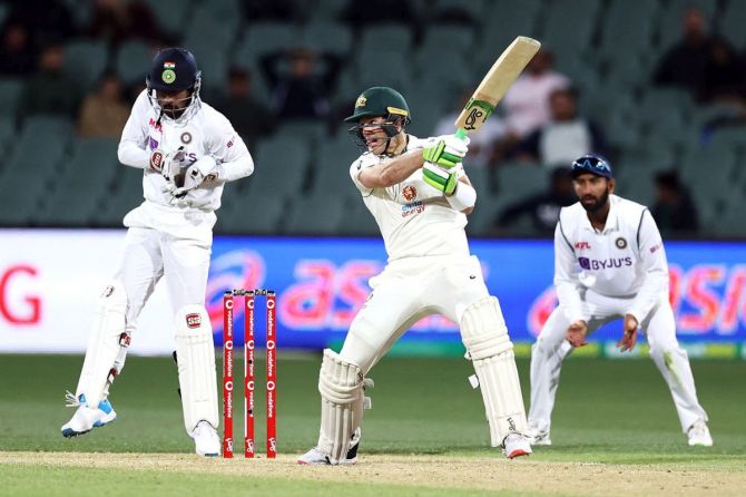 Australia captain Tim Paine scored a fighting fifty on a difficult pitch