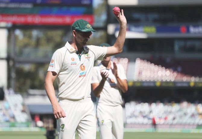 Josh Hazelwood acknowledges the crowd after taking five wickets in the second innings on Day 3 of the first Test match at Adelaide Oval on Saturday