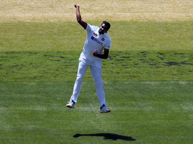 India's Ravichandran  Ashwin celebrates taking the wicket of Australia's Steve Smith during Day 1 of the second Test at the Melbourne Cricket Ground on Saturday.