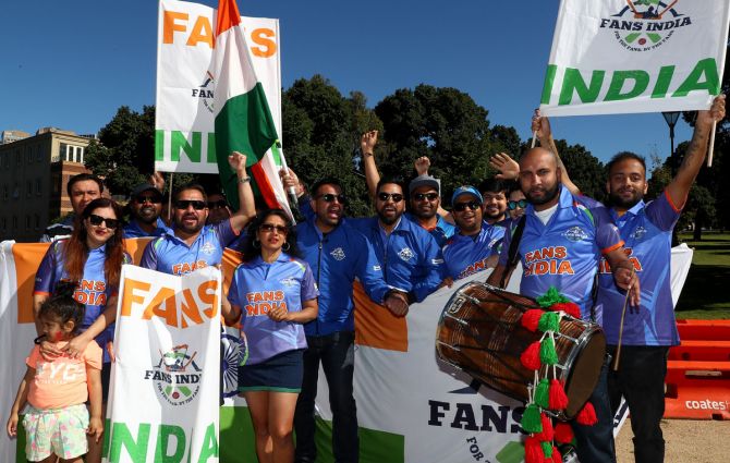 Indian fans show their support during Day 1 of the second Test between Australia and India at the Melbourne Cricket Ground on Saturday. 