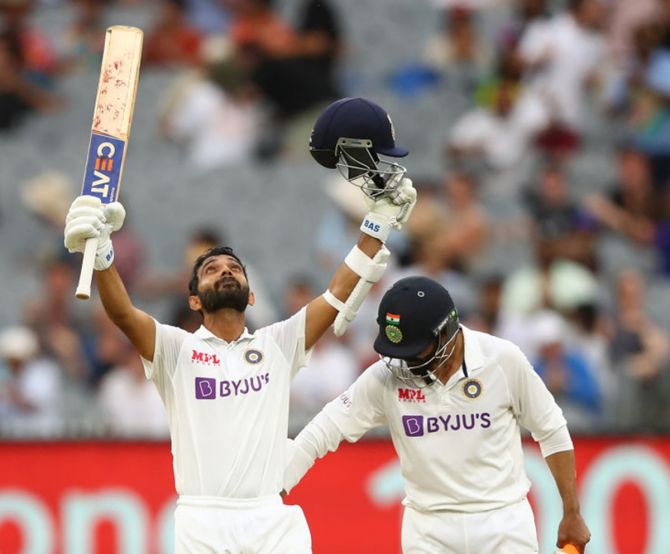 Ajinkya Rahane celebrates after getting to hundred on Day 2 of the second Test between Australia and India, at the Melbourne Cricket Ground, on Sunday.