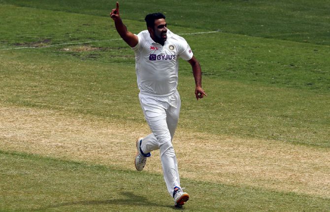India spinner Ravichandran Ashwin launches into a celebratory run after dismissing Marnus Labuschagne.