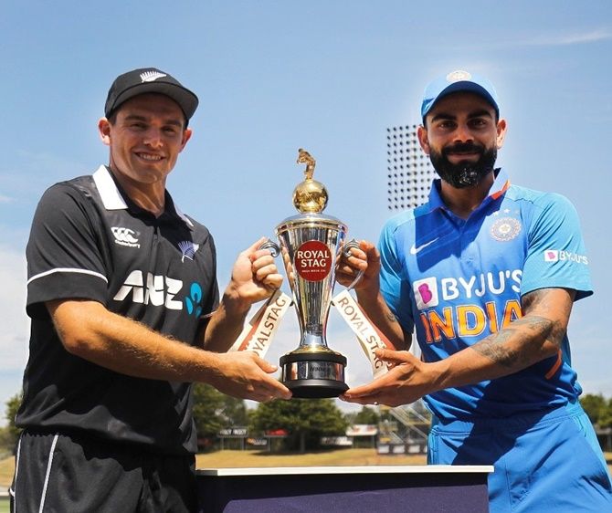New Zealand's skipper Tom Latham and India skipper Virat Kohli pose with the trophy on the eve of the three-match ODI series, starting in Hamilton on Wednesday.