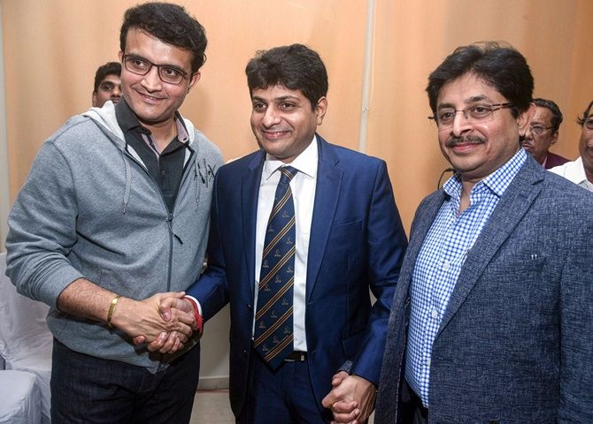 BCCI president Sourav Ganguly congratulates newly-elected Cricket Association of Bengal president Abhishekh Dalmiya and his brother, Snehashis Ganguly, who was elected CAB secretary, in Kolkata, on Wednesday.