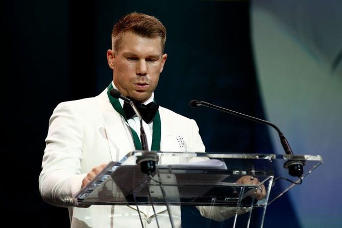 David Warner fights back tears on stage after accepting the Allan Border Medal during the 2020 Cricket Australia Awards, at Crown Palladium, in Melbourne, on Monday.