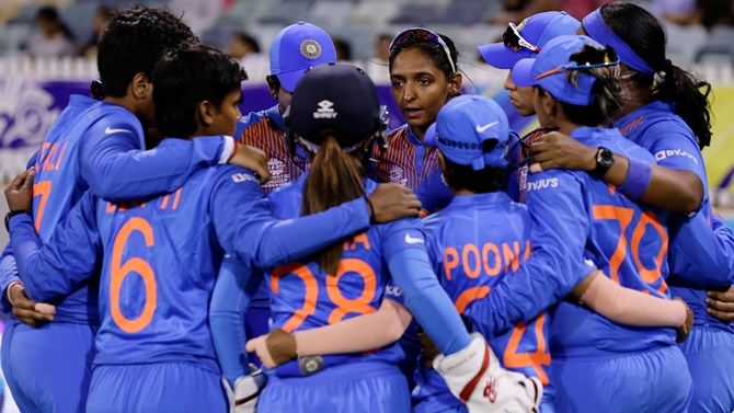 India's captain Harmanpreet Kaur discusses strategy with her teammates before the ICC women's T20 World Cup match against Bangladesh, at the WACA in Perth.