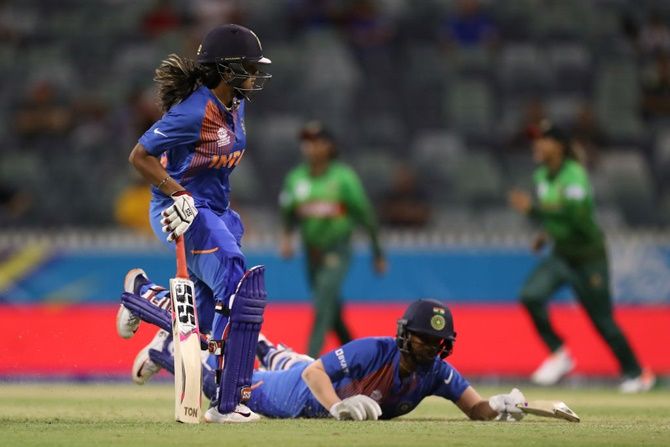 India's Veda Krishnamurthy and Deepti Sharma run to the same end during the ICC women's T20 World Cup match against Bangladesh
