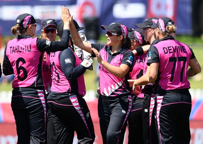 New Zealand's players celebrate after defeating Bangladesh in the women's T20 World Cup, at Junction Oval in Melbourne