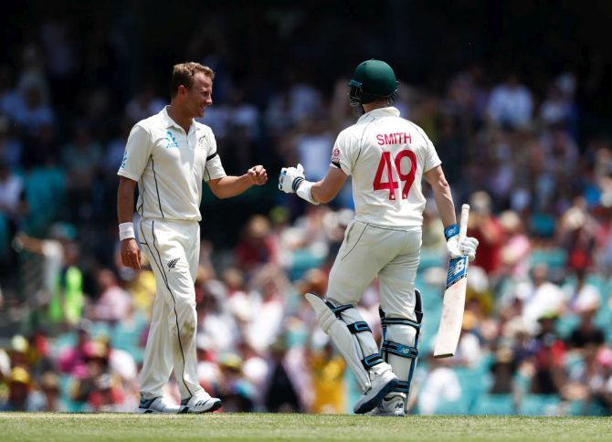 Australia's Steve Smith fist bumps New Zealand's Neil Wagner after scoring his first run after facing 39 balls
