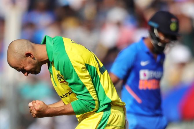 Australia's Ashton Agar celebrates after dismissing India'S KL Rahul during the 1st ODI at the Wankhede Stadium in Mumbai on Tuesday