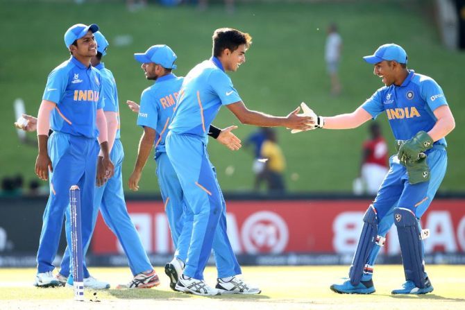 India Under-19 players celebrate a Sri Lankan wicket during their match on Sunday