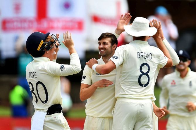 England's Mark Wood and team mates celebrates the wicket of South Africa's Kagiso Rabada during day 5 of the 3rd Test match between South Africa and England at St Georges Park in Port Elizabeth on Monday. He finished the innings with figures of 3 for 32