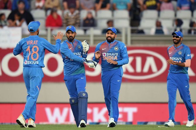 India players celebrate a New Zealand wicket in the first T20I on Friday