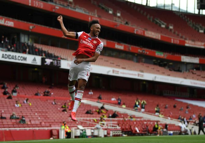 Arsenal's Pierre-Emerick Aubameyang celebrates after scoring against Norwich City during their Premier League match at Emirates Stadium in London.