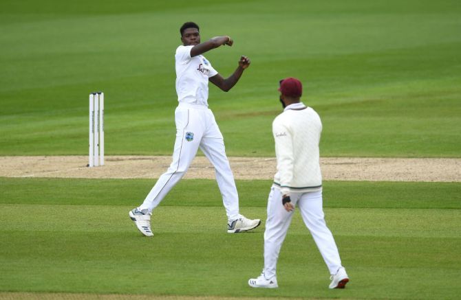 West Indies' Alzarri Joseph celebrates on scalping the wicket of England captain Joe Root 