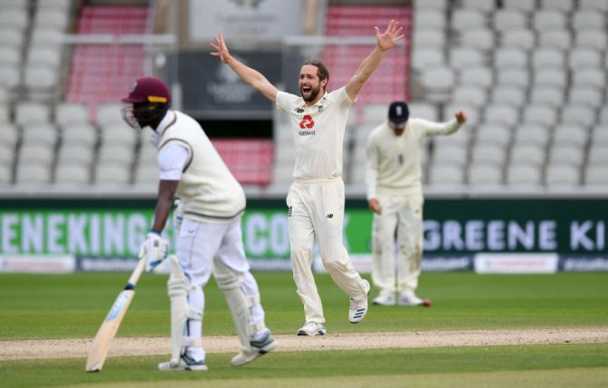 Chris Woakes appeals successfully for the wicket of Roston Chase