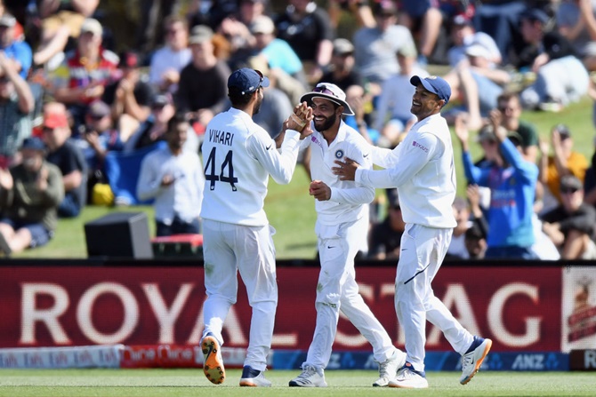 Ravindra Jadeja is congratulated by teammates after taking the catch to dismiss Neil Wagner on Day 2 second Test, at Hagley Oval in Christchurch, on Sunday.