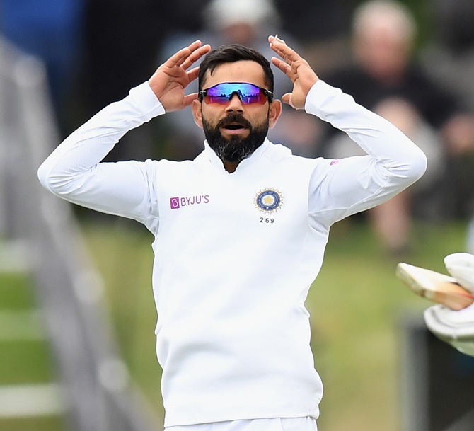India's skipper Virat Kohli and his teammates celebrate Kane Williamson's dismissal on Day 2 of the second Test against New Zealand, at Hagley Oval in Christchurch, on Sunday.