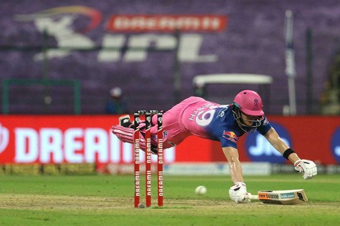 Steve Smith captain of Rajasthan Royals dives to get back into the crease against the Kings XI Punjab at the Sheikh Zayed Stadium, Abu Dhabi