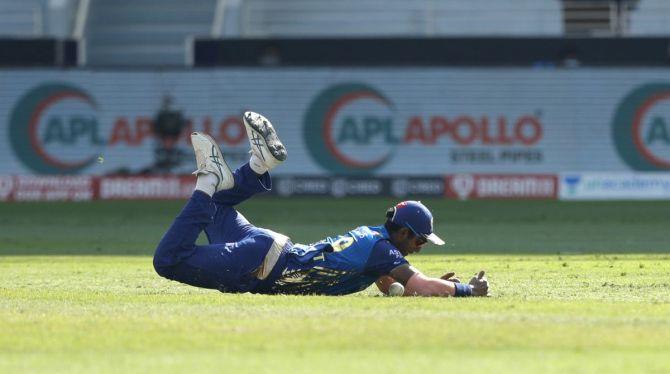 Mumbai Indians' Jayant Yadav puts in a dive while fielding during the match against Delhi Capitals on October 31, 2020.