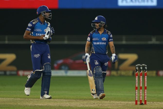 Hardik Pandya and Ishan Kishan walk back after  powering Mumbai Indians to an impressive score