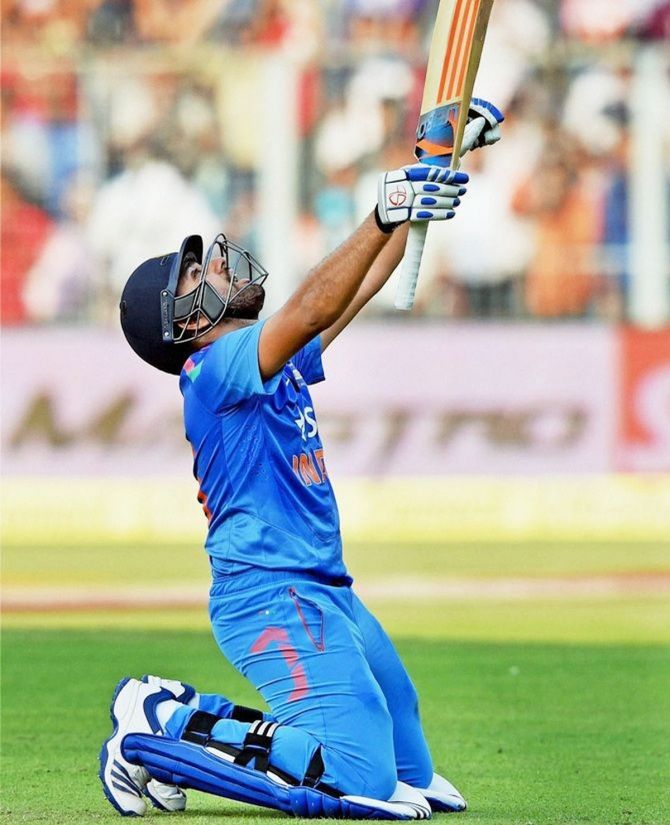 Rohit Sharma celebrates on scoring a double century en route his innings of 264 against Sri Lanka at Eden Gardens on November 13, 2014