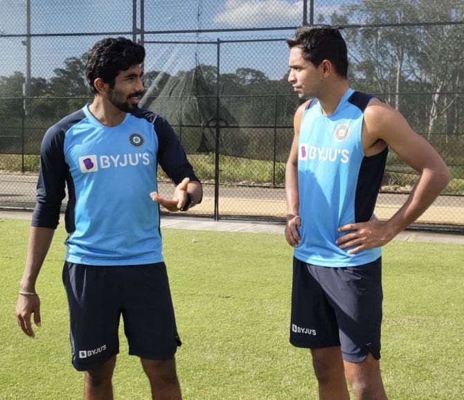 India's Jasprit Bumrah with youngster Kartik Tyagi in the nets on Wednesday