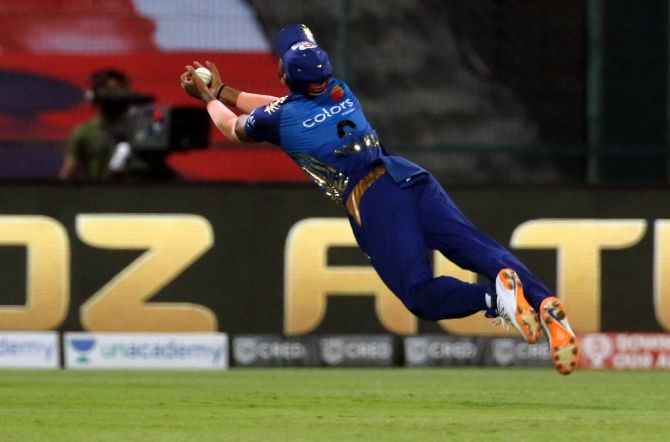 Substitute fielder Anukul Roy takes a diving catch to dismiss Mahipal Lomror.