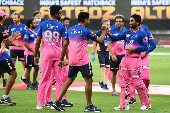 Rahul Tewatia is congratulated by his Rajasthan Royals teammates after steering the side to a thrilling victory over SunRisers Hyderabad in the IPL match in Dubai on Sunday.