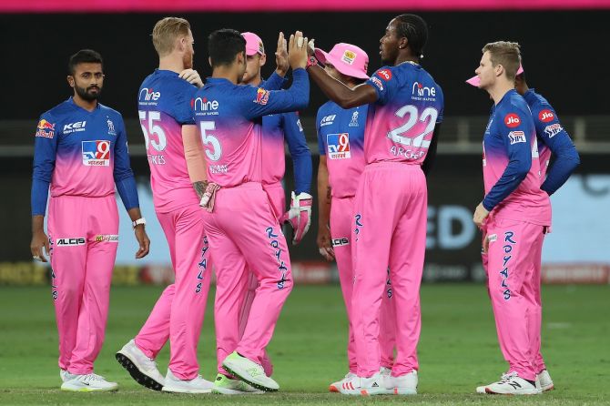 Jofra Archer is congratulated by his Rajasthan Royals teammates after dismissing Ajinkya Rahane.