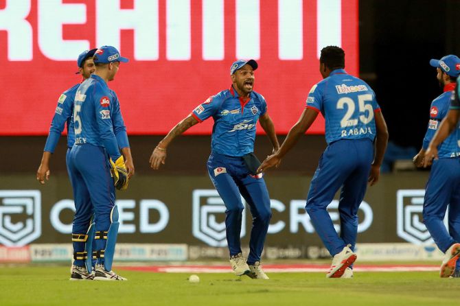 Delhi Capitals players celebrate after Shikhar Dhawan catches Chennai Super Kings batsman Faf du Plessis off the bowling of Kagiso Rabada during their IPL match in Sharjah.