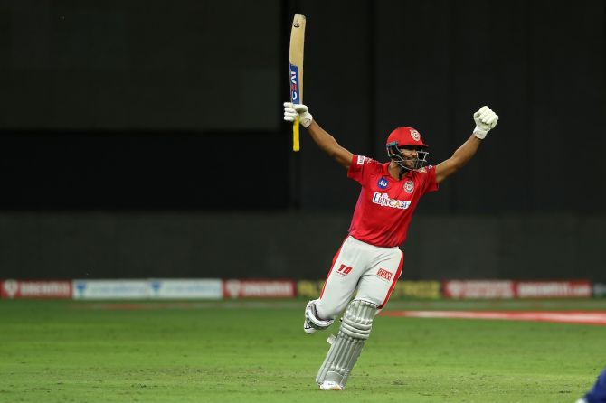 Mayank Agarwal celebrates after hitting the winning runs for Kings XI in the second Super over
