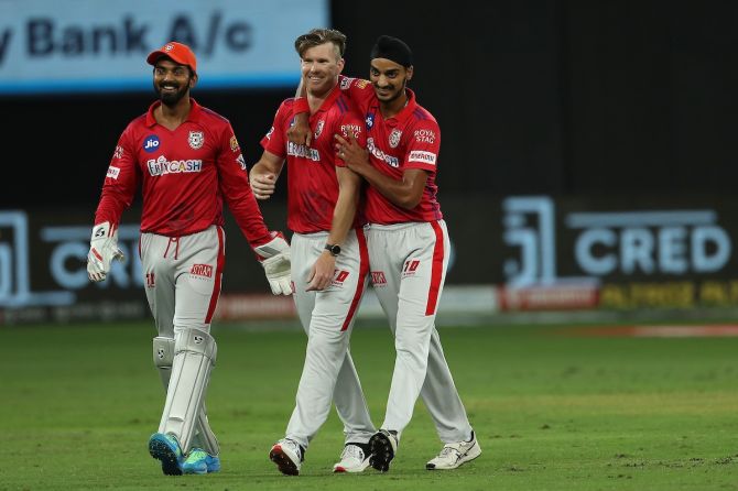 James Neesham is congratulated by Arshdeep Singh and K L Rahul after dismissing Prithvi Shaw.