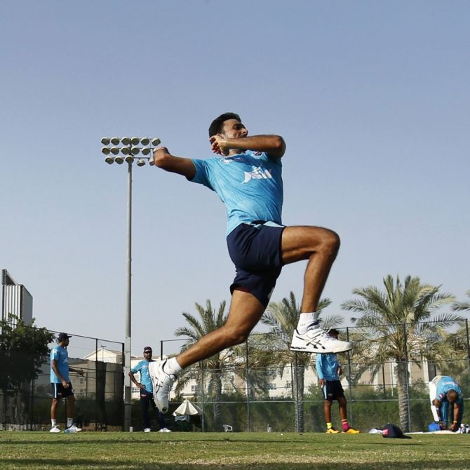 Mumbai Indians' Harshal Patel bowls in a training session