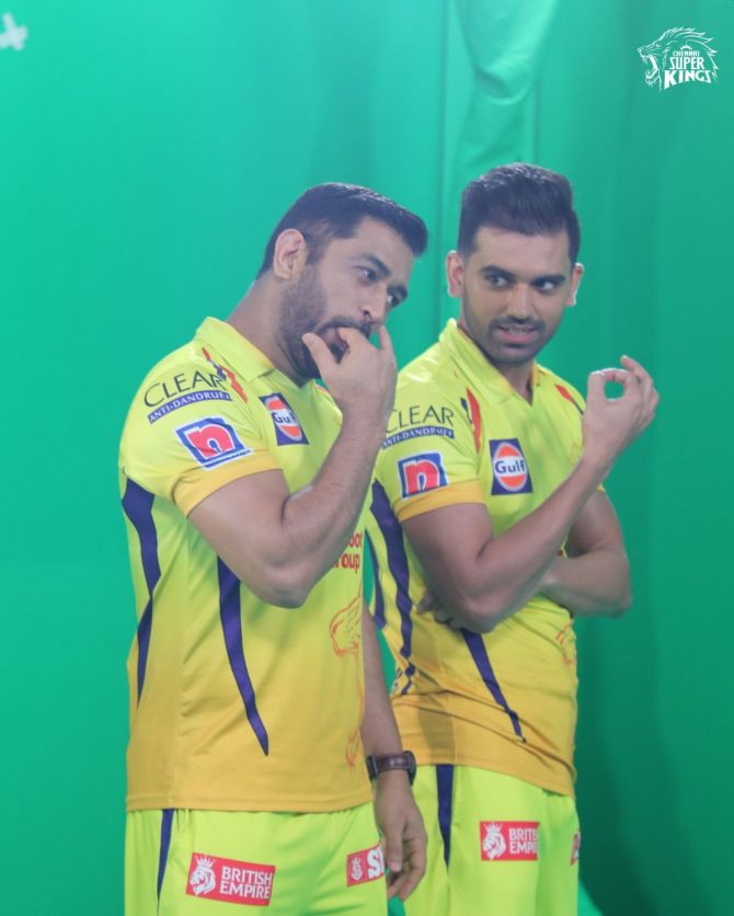 Chennai Super Kings captain Mahendra Singh Dhoni gives bowler Deepak Chahar lessons on how to whistle during a promotional event on Tuesday