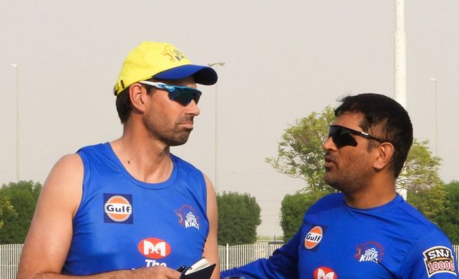 Chennai Super Kings' coach Stephen Fleming with captain MS Dhoni at a training session.