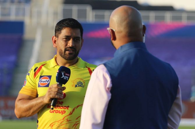 Mahendra Singh Dhoni debuts his new look at the toss before the Indian Premier League opening match on Saturday