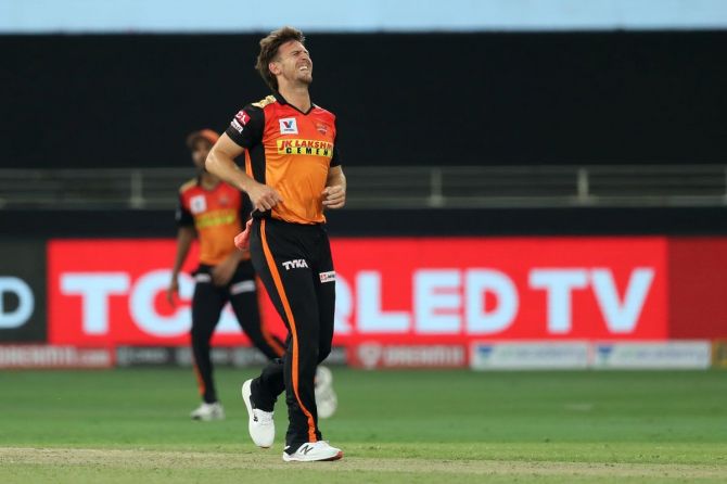 Sunrisers Hyderabad's Mitchell Marsh grimaces in pain after suffering an ankle injury during the match against Royal Challengers Bangalore on Monday