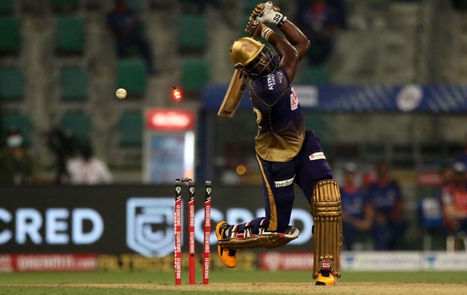 Andre Russell is bowled by Jasprit Bumrah