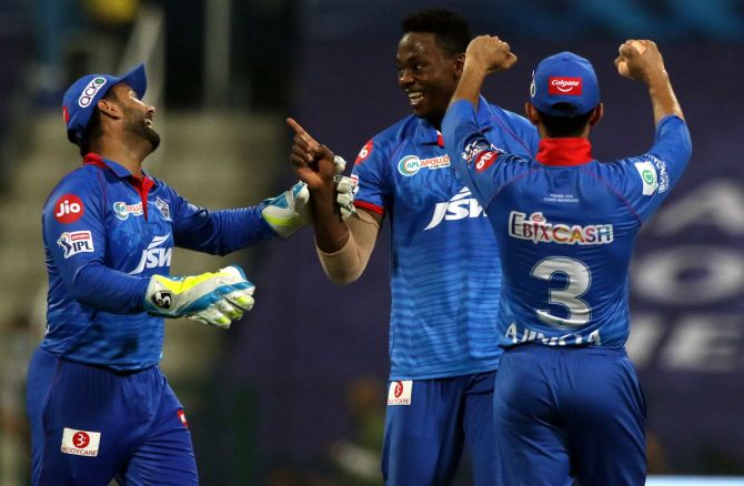 Kagiso Rabada, centre, celebrates with team-mates after taking the wicket of Jonny Bairstow