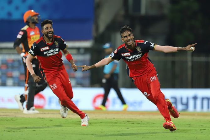Royal Challengers Bangalore's Shahbaz Ahmed celebrates after dismissing Abdul Samad 