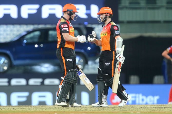 Sunrisers Hyderabad batsmen Jonny Bairstow and Kane Williamson celebrate a boundary during the IPL against Punjab Kings, in Chennai, on Wednesday.