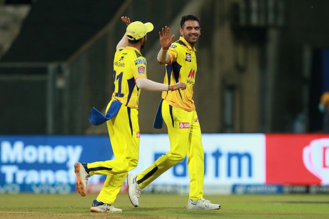 Chennai Super Kings pacer Deepak Chahar celebrates after taking the wicket of Nitish Rana