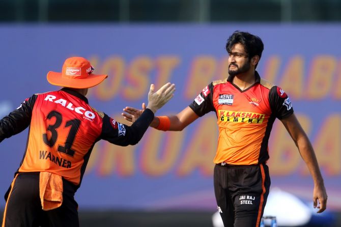 Sunrisers Hyderabad pacer Khaleel Ahmed celebrates with skipper David Warner after dismissing Punjab Kings batsman Fabian Allen in Wednesday's IPL match in Chennai. 