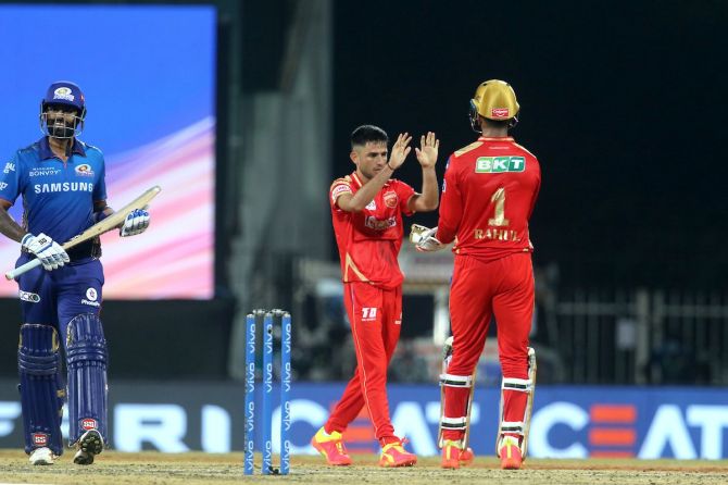 Punjab Kings' Ravi Bishnoi celebrates the wicket of Mumbai Indians' Surya Kumar Yadav 