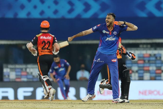 Axar Patel celebrates the wicket of Rashid Khan