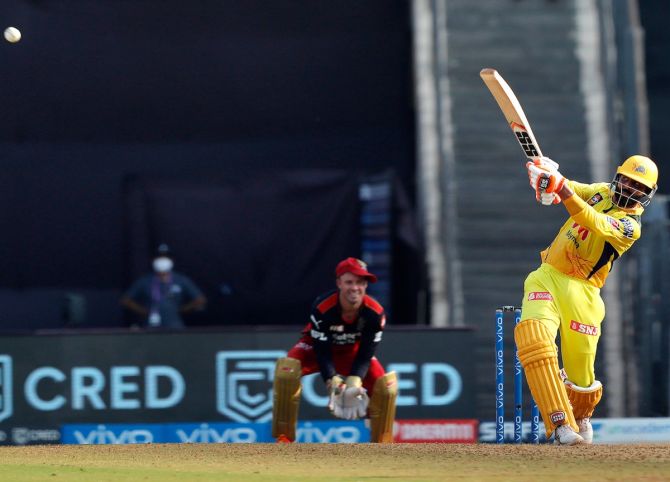 Chennai Super Kings batsman Ravindra Jadeja sends the ball into the stands for a six during the IPL match against Royal Challengers Bangalore, in Mumbai, on Sunday.