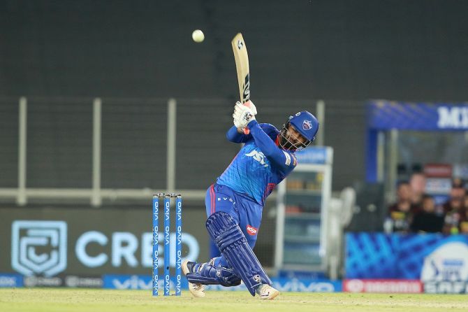 Rishabh Pant hits a six.