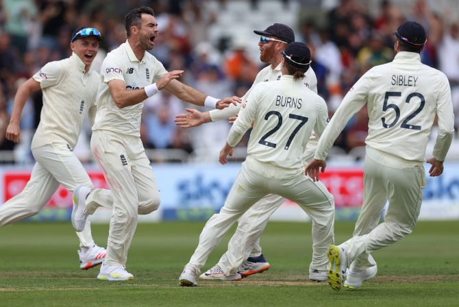 England's players celebrate after James Anderson dismisses Virat Kohli during Day 2 of the first Test against India, at Trent Bridge in Nottingham, on Thursday.